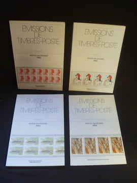"Lot de quatre notices philatéliques ""Emissions de Timbres-poste""". Collectif