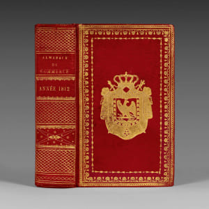 par J. de la Tynna, de la Société d’Encouragement pour l’Industrie nationale. Année 1812. XVe année. Prix : 10 fr., et 13 fr., franc de port par la poste, pour tout l’Empire. L’Almanach du commerce pour l’année 1812 relié à l’époque aux armes de l’Empereur Napoléon Ier (1769-1821).