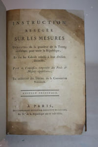 Instruction abrégée sur les mesures déduites de la grandeur de la Terre, uniformes pour toute la République, et sur les calculs relatifs à leur division décimale; par la Commission temporaire des poids et mesures républicaines, en exécution des décrets de la Convention Nationale. Edition originale.