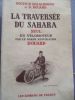 La traversée du Sahara seul en vélomoteur par le garde républicain Douard. Malachowski (Docteur) Douard (D)