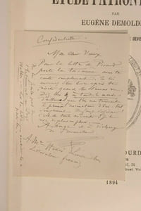 Etude Patronymique par Eugène Demolder, avec quelques reproductions brutales de devises inédites du temps.
+ Billet autographe