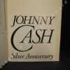 Johnny Cash. Silver Anniversary. CASH, Johnny - CARR, Patrick - HOOPER, Charles (Book design)