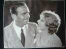 Tirage sépia daté de 1929 (35X27) signé par Douglas Fairbanks et Mary Pickford.. FAIRBANKS Douglas - PICKFORD Mary