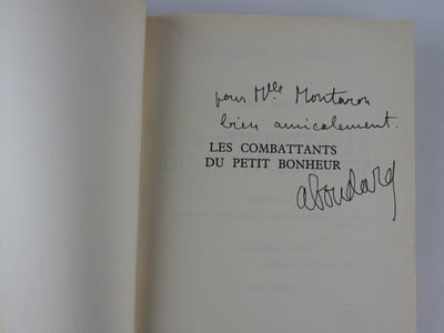 Les combattants du petit bonheur. Envoi autographe signé. 