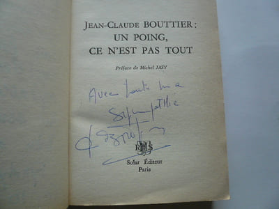 Jean-Claude Bouttier : un poing, ce n'est pas tout. Exemplaire enrichi d'un envoi autographe signé de l'auteur et de J.-C. Bouttier