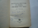 Jean-Claude Bouttier : un poing, ce n'est pas tout. Exemplaire enrichi d'un envoi autographe signé de l'auteur et de J.-C. Bouttier. Andy Dickson. ...