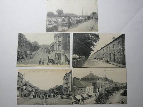 Réunion de 13 cartes postales anciennes (années 20) représentant la ville de LENS (Pas-de-Calais) : Corons, Bvd des Ecoles-Marché aux Légumes, Rue de ...