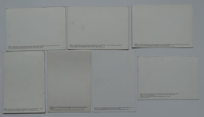 Réunion de 7 cartes cartes postales sur les réalisations et projets de Christo : La Côte Empaquetée. Le Rideau dans la Vallée. Le Pont-Neuf Empaqueté (2 vues). The Pont-Neuf Wrapped, project for Paris. Two Lower Manhattan Buildings, project for New York City. Les Iles Entourées.