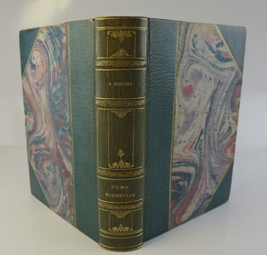 Numa Roumestan. Moeurs parisiennes. Frontispice gravé sur bois par Pierre Gusman. Ornements typographiques dessinés et gravés sur bois par Maurice de ...