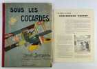 Sous les cocardes. Scènes de l'aviation militaire. Edition originale sur papier courant ( il n'a été tiré que 25 ex. sur papier vergé numéroté).. ...