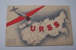 Stand de l'Union des Républiques Socialistes Soviétiques à la 15e Exposition Internationale de l'Aéronautique, Paris 1936. Avions ANT-25, ZKB-19, ...