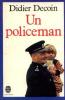 Un policeman. Didier Decoin
