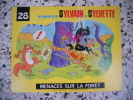 Les aventures de Sylvain et Sylvette - N° 28 - Menaces sur la foret. Robert Genin / Claude Dubois