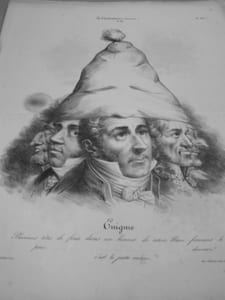 Enigme. Plusieurs têtes de fous dans un bonnet de coton blanc formant la poire……….devinez ! c’est le juste-milieu.Lithographie originale en noir sur Velin blanc.