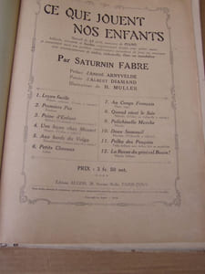 Ce que jouent nos enfants - 12 morceaux amusants et faciles soigneusement doigtés pour le piano comportant aussi une partition supplémentaire avec accompagnement de violon violoncelle flute ou mandoline.Préface d'André Arnyvelde - Poésies d'Albert Diamand - Illustrations de H.Muller.