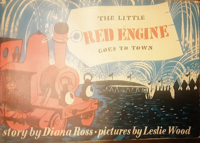 THE LITTLE RED ENGINE GOES TO TOWN
Le petit train rouge va en ville