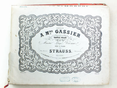 [ Recueil de Partitions ] Hommage à Mme Gassier. Grande valse du Maestro Luigi Venzano pour le Piano par Strauss - Frères et Tambours. 2e Quadrille Brillant pour le Piano à Quatre mains par le Comte A. de Monbrun - Le Postillon de Longjumeau, Quadrille sur les motifs d'Ad. Adam par Strauss - Il Bacio (Le Baiser), Valse chantée par Mademoiselle Pocciolomini composée par L. Arditi réduite pour piano seul par Em. Desgranges - Les Roses, suite de Valses pour le Piano par Olivier Métra - Le Soir, suite de Valses pour le Piano par Olivier Métra - Le Bouquet de Valses pour le Piano par Ernest Bouc - Indiana, grande valse pour piano par G. Marcailhou - Suite de Valses sur des motifs du Pardon de Ploërmel de Meyerbeer pour le piano par Strauss - Le Brasseur de Preston, Opéra comique en 3 actes musique d'Adolphe Adam. Deux quadrilles de contredanses composés pour le Piano par Musard - Grande suite de Valses. La Fille de Madame Angot musique de Ch. Lecocq par Olivier Métra - Le Torrent, Grande Valse brillante pour Piano par G. Marcailhou