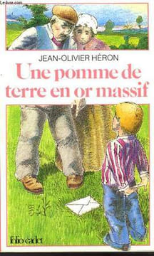 UNE POMME DE TERRE EN OR MASSIF. HERON JEAN-OLIVIER