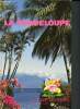 La Guadeloupe - la route des fleurs - un nouvel art de voyager + 1 carte postale des antilles. Guist'hau loic, thebaud philippe