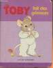 Toby fait des grimaces. Szekeres Cyndy