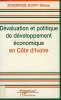 DEVALUATION ET POLITIQUE DE DEVELOPPEMENT ECONOMIQUE EN COTE D'IVOIRE. KOUMOUE KOFFI MOISE