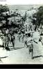 "Photographie originale d'une rue d'une ville d'Haïti (extraites de l'émission ""Les Lois de l'Hospitalité proposé par Jean Claude Charles"")". ...