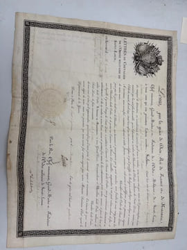 Lettres de chevalier de l'Ordre militaire de Saint-Louis. en faveur de M. Govon, capitaine du corps royal des Dragons de France. [BREVET]. 