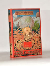 L'ILE A HÉLICE. 80 illustrations par L. Benett dont 12 grandes gravures en chromotypographie. 1 carte en couleurs et 2 cartes en noir.