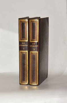 L'INGÉNIEUX HIDALGO DON QUICHOTTE DE LA MANCHE. Traduit et annoté par Louis Viardot, vignettes de Tony Johannot. [2 volumes].. CERVANTÈS (Miguel de).
