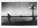 Saxophone sur un quai. Photographie originale. . LOUIS, Christian. 