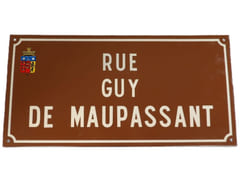 RUE GUY DE MAUPASSANT. Belle plaque de rue émaillée, fond brun et texte blanc en relief. Ville de Ouistreham en Normandie.  par MAUPASSANT, Guy de. 