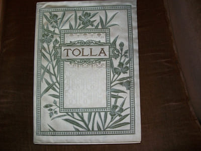 TOLLA.