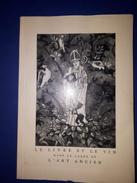 Le livre et le vin dans le cadre de l'Art Ancien.