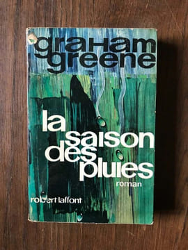 LA SAISON DES PLUIES a BURNT OUT case ROBERT LAFFONT. Greene Graham