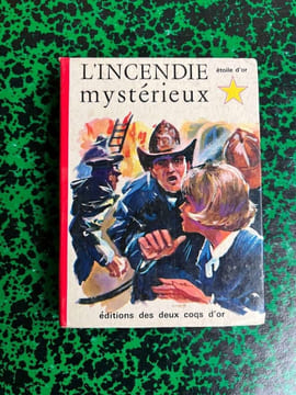 j james L'incendie mystérieux Etoile d'or. undefined