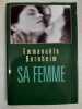 Sa femme. 