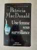 Une femme sous surveillance. MacDonald Patricia