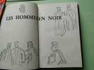Les hommes en noir. 