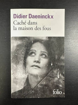 Caché dans la maison des fous. Daeninckx Didier