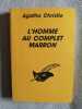 L'HOMME AU COMPLET MARRON. Agatha Christie