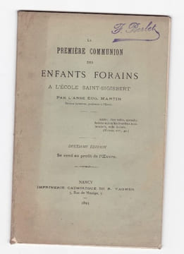La première communion des enfants forains a l'école saint Sigisbert . Abbé E Martin