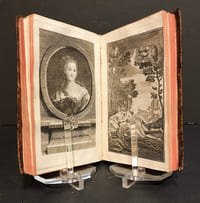 [Poésie au XVIII°s. : deux ouvrages en un volume]. BERNARD (P.-J., dit Gentil...). L'Art d'aimer, et Poésies diverses... Amsterdam, Aureliad, 1775 ; 176 pages. [DUBOCAGE (Mme Anne-Marie Lepage)]. Le Paradis terrestre, poëme imité de Milton, par Madame D. B***. Londres, 1760 ; 2ff.-112pp.- portrait & frontispice, vignette de titre & 6 bandeaux. - (Quérard II, p. 598). Marge du titre courte, mouillure claire et tavelures sur quelques feuillets.