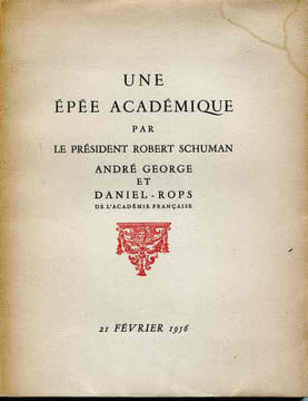 Une épée académique par le Président Robert Schuman, André George et Daniel-Rops de l'Académie française. SCHUMAN (Robert), GEORGE (André), ...