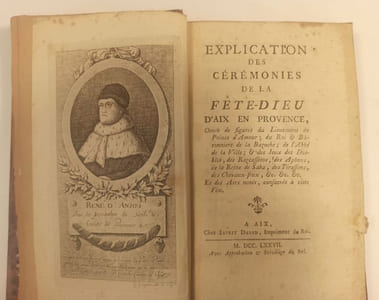 Explication des cérémonies de la Fête-Dieu d'Aix en Provence, ornée de figures du Lieutenant de Prince d'Amour, du Roi & Bâtonniers de la Bazoche, de l'Abbé de la Ville, & des Jeux des Diables, des Razcaffetos, des Apôtres, de la Reine de Saba, des Tirassons, des Chevaux-frux, &c. &c. &c. Et des Airs notés, consacrés à cette Fête.