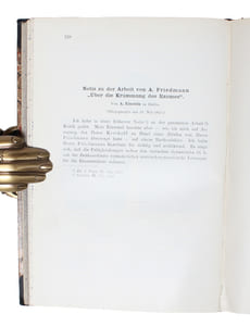 Über die Krümmung des Raumes. + Über die Möglichkeit einer Welt mit konstanter negativer Krümmung des Raumes. + (Einstein's two remarks to the first paper): Bemerkung ... + Notiz ... - [THE CURVATURE OF SPACE]