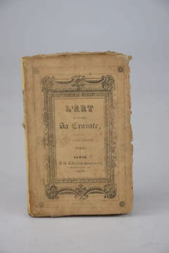 L'Art de mettre sa cravate de toutes les manières connues et usitées, enseigné et démontré en seize leçons, précédé de l'Histoire complète de la ...