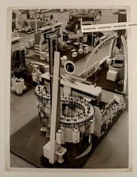 REPORTAGE PHOTOGRAPHIQUE : [SAUNIER-DUVAL au Salon des Arts ménagers, Grand Palais, Paris, 1952]. -