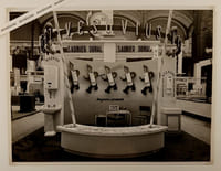 REPORTAGE PHOTOGRAPHIQUE : [SAUNIER-DUVAL au Salon des Arts ménagers, Grand Palais, Paris, 1952]. -