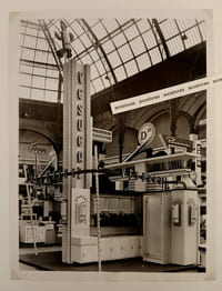 REPORTAGE PHOTOGRAPHIQUE : [SAUNIER-DUVAL au Salon des Arts ménagers, Grand Palais, Paris, 1952]. -