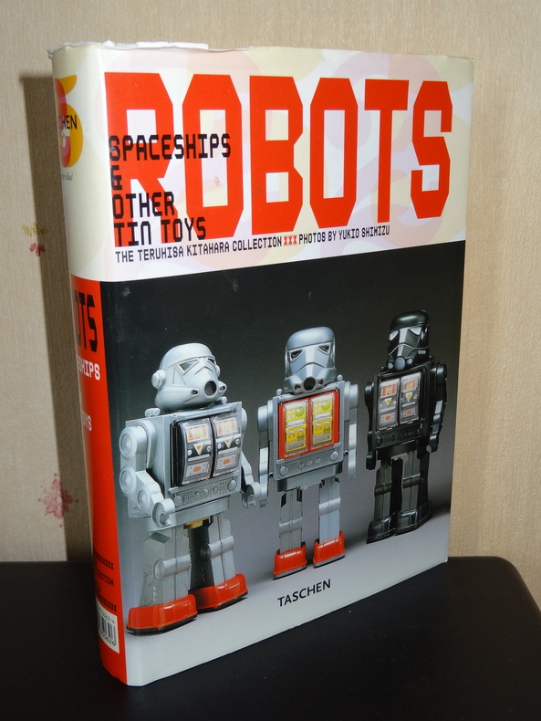 Robots spaceships and other tin toys